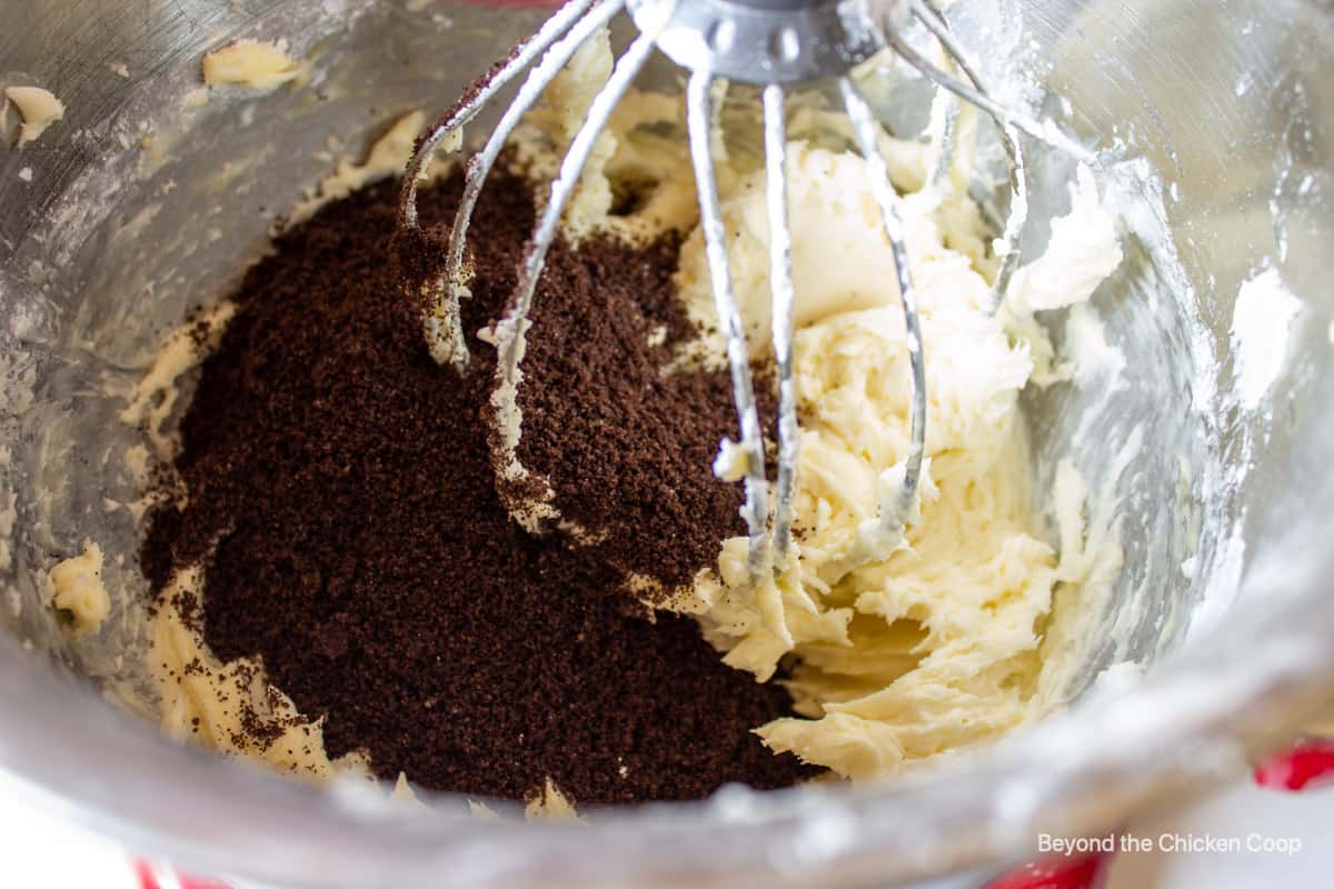 Adding cookie crumbs to buttercream.