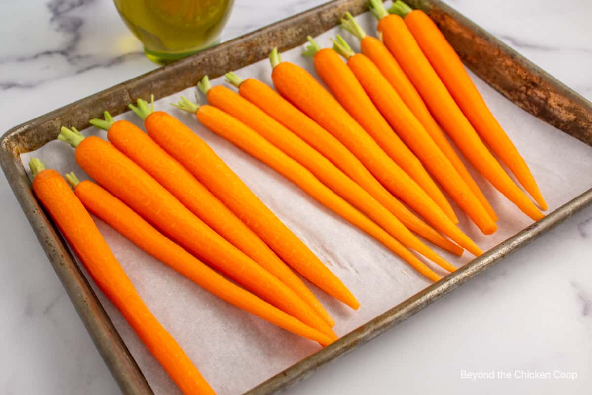 Carrots on a baking sheet.