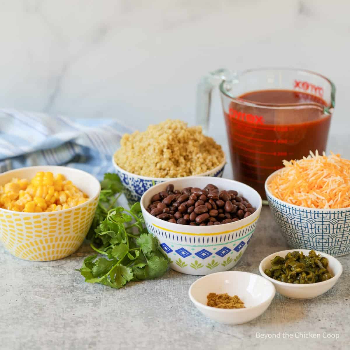 Ingredients for making quinoa enchilada bake.