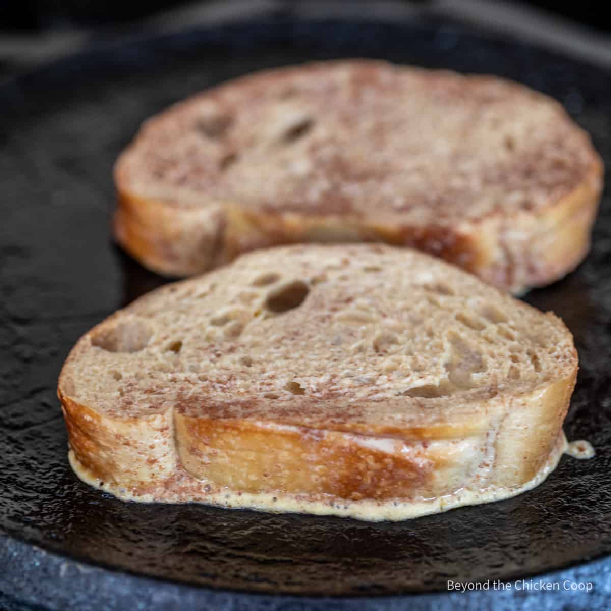 Cooking french toast on a griddle.