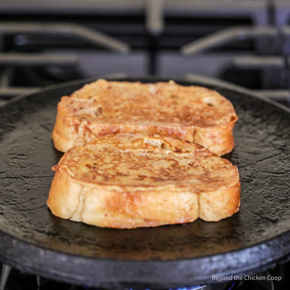 Cooking breakfast bread on a griddle.