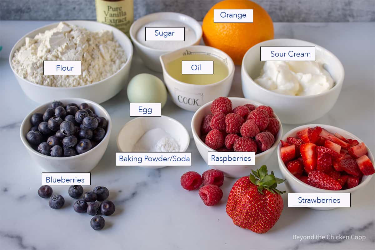 Small bowls filled with muffin ingredients.