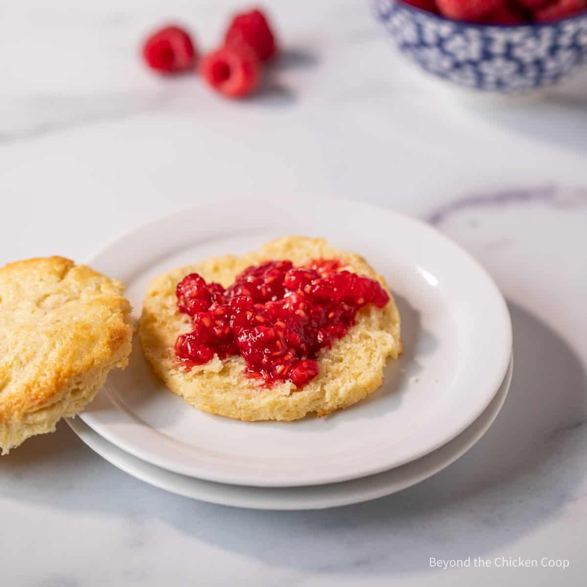 Making a shortcake with raspberries.