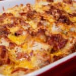 A closeup shot of an egg casserole with bacon.