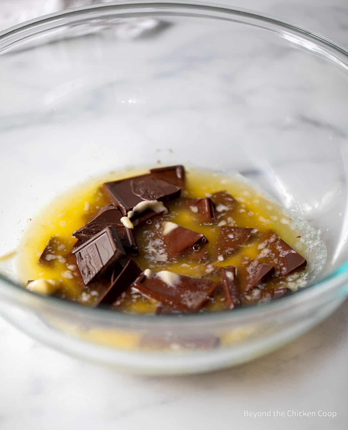 Chocolate and butter melting in a bowl.