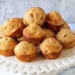 A platter filled with banana walnut muffins.