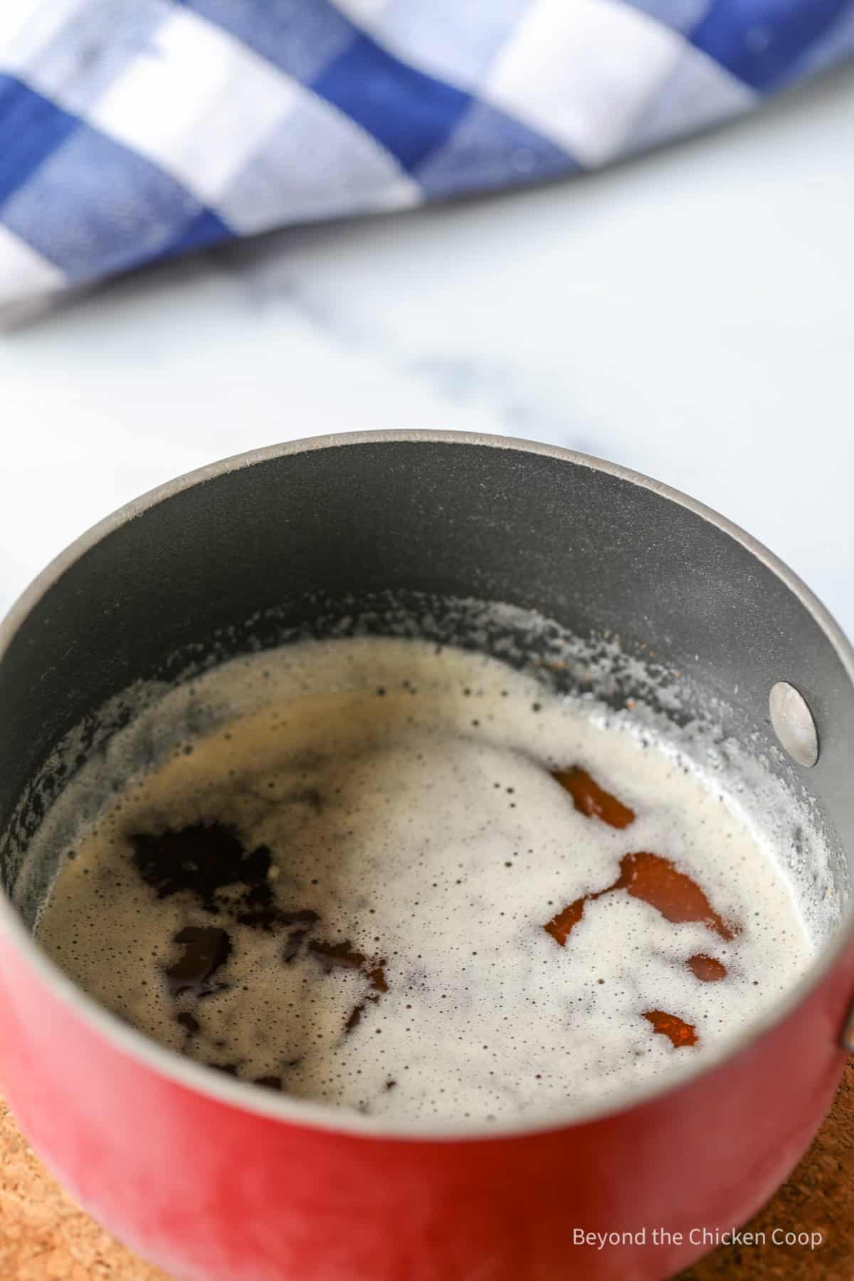 Browned butter in a small pan.