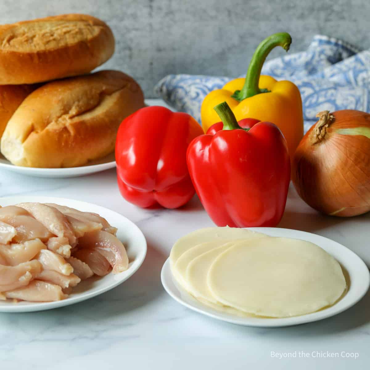 Ingredients for making a chicken sandwich.