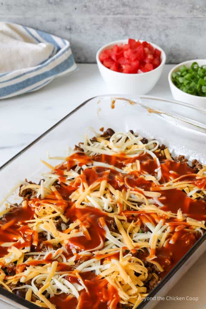 Enchilada sauce on a casserole.