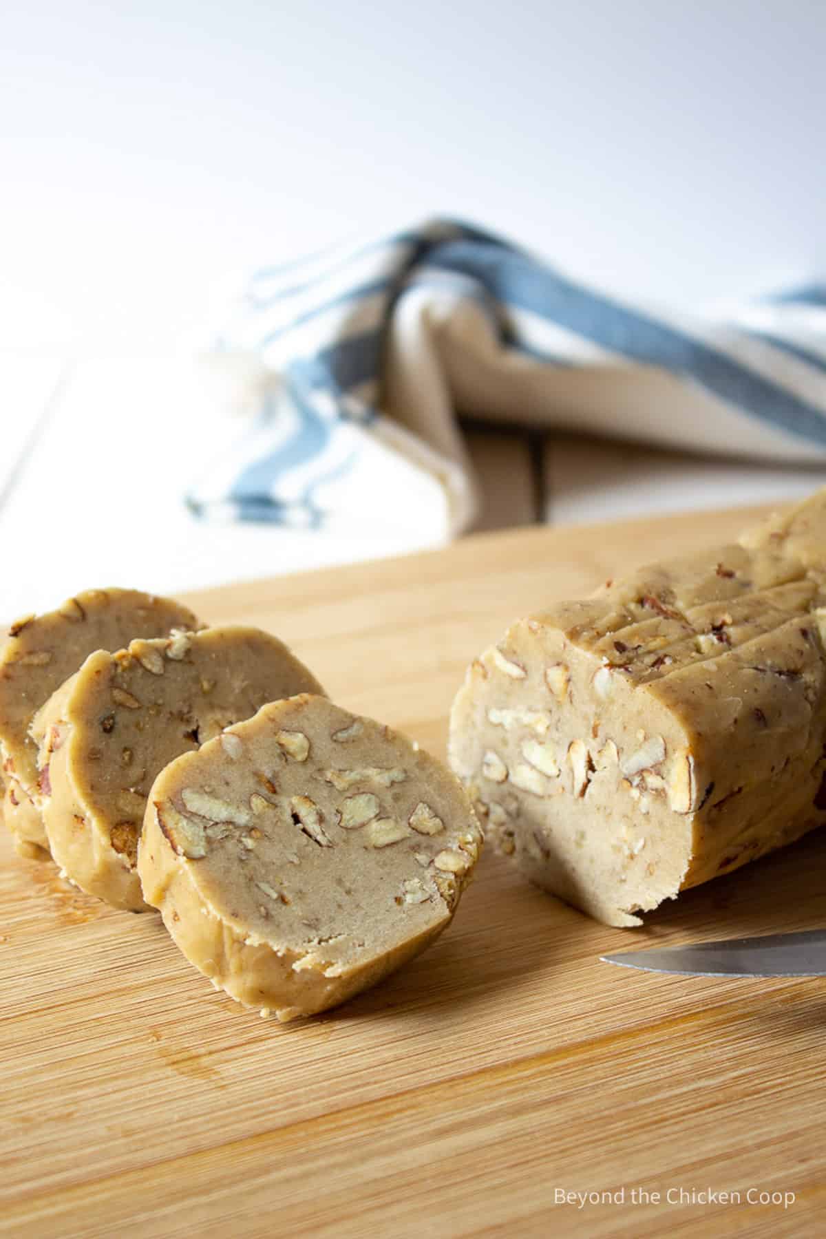 Cutting cookie dough into rounds.