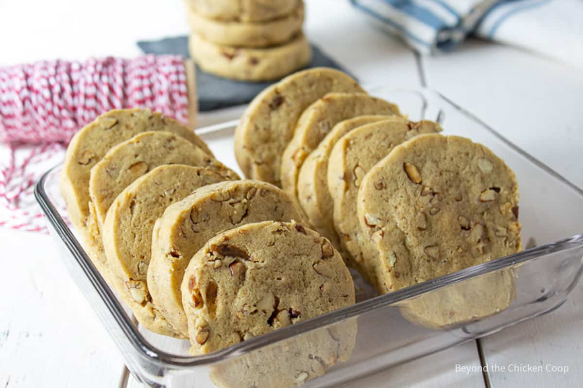 Pecan Icebox Cookies in a glass dish.