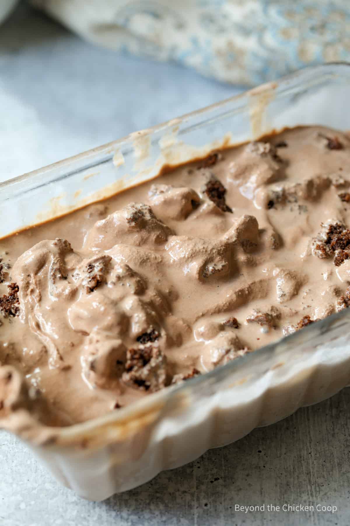 Soft chocolate ice cream with bits of brownies in ice cream. 