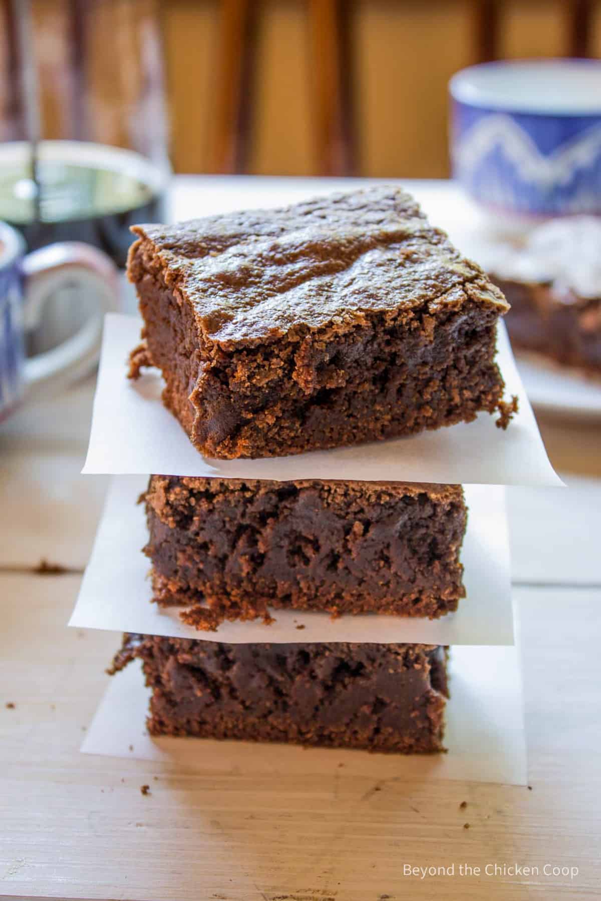 A stack of three brownies.