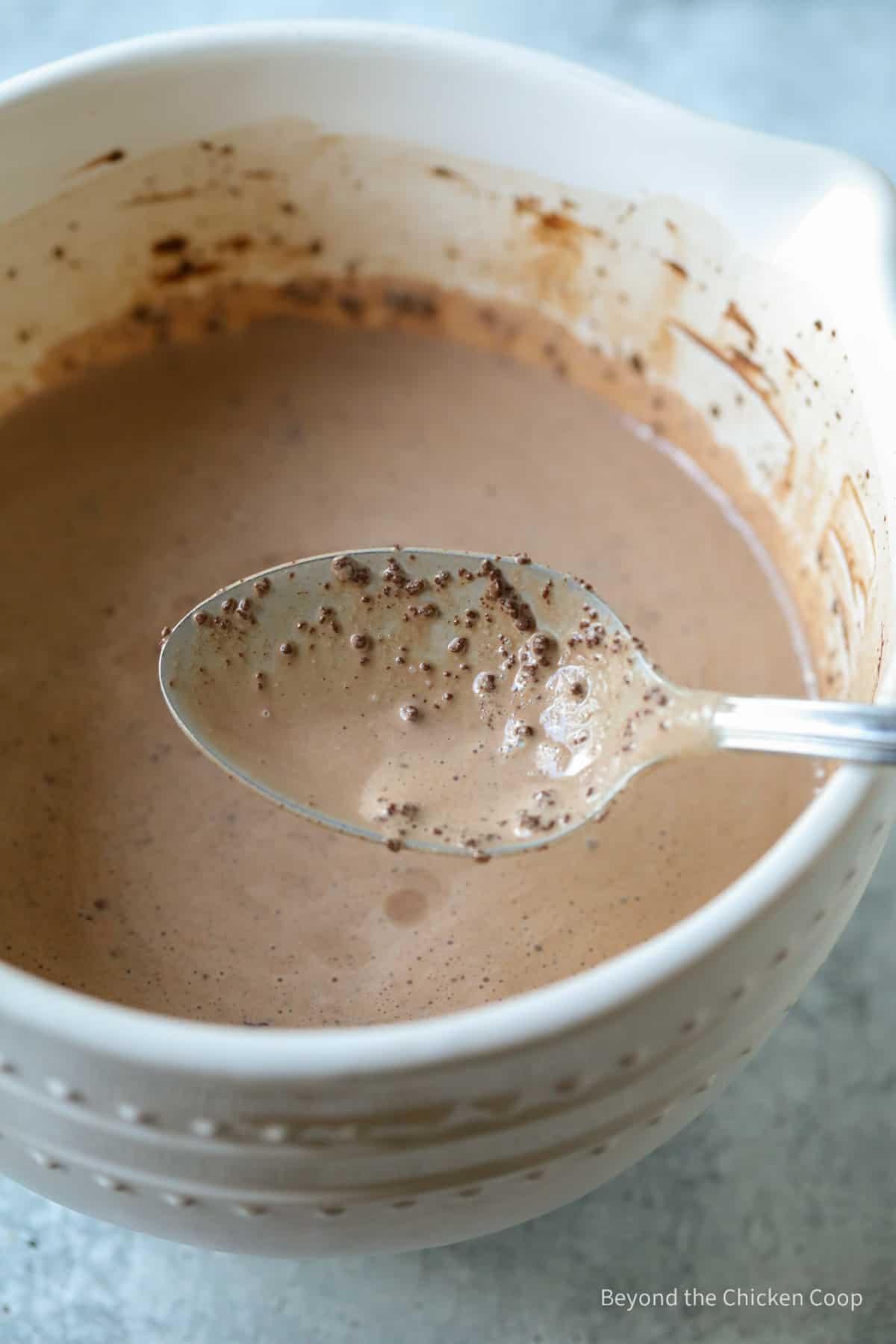 Lumpy brown bits on a spoon.