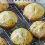 Zucchini muffins on a baking rack.