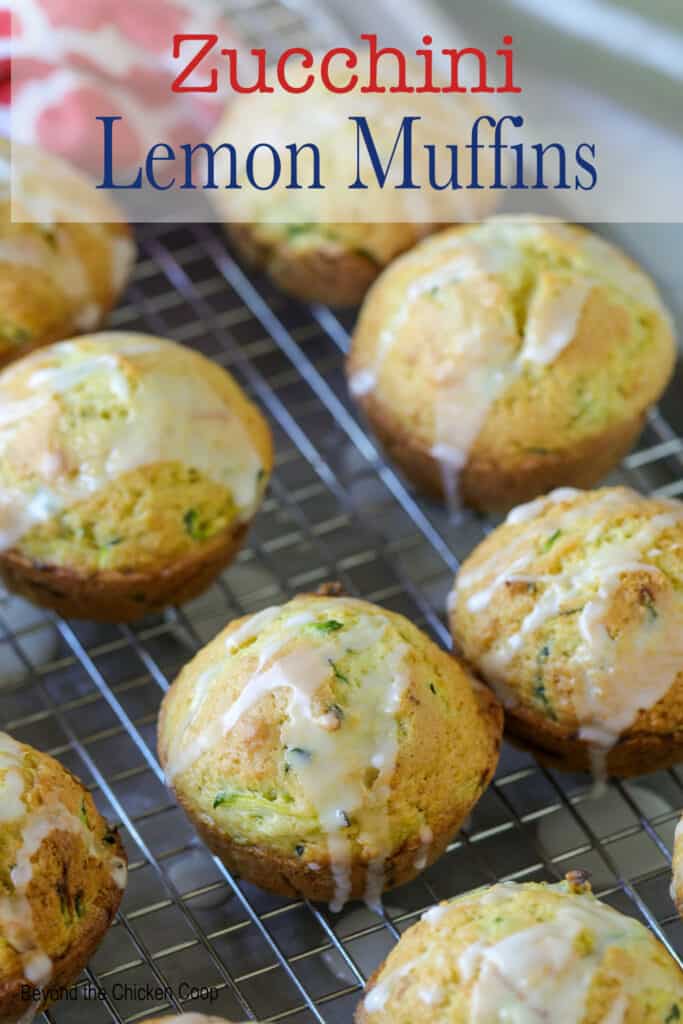 Zucchini muffins on a baking rack.
