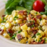 Corn with bacon and fresh herbs.