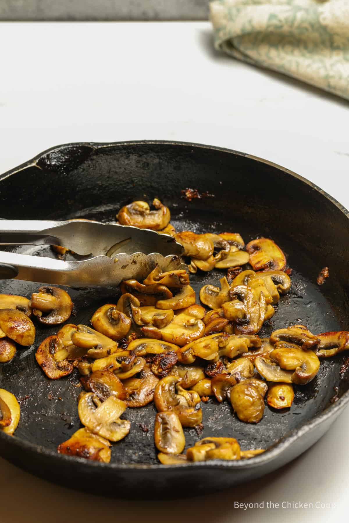 Sauteed mushrooms in a pan. 