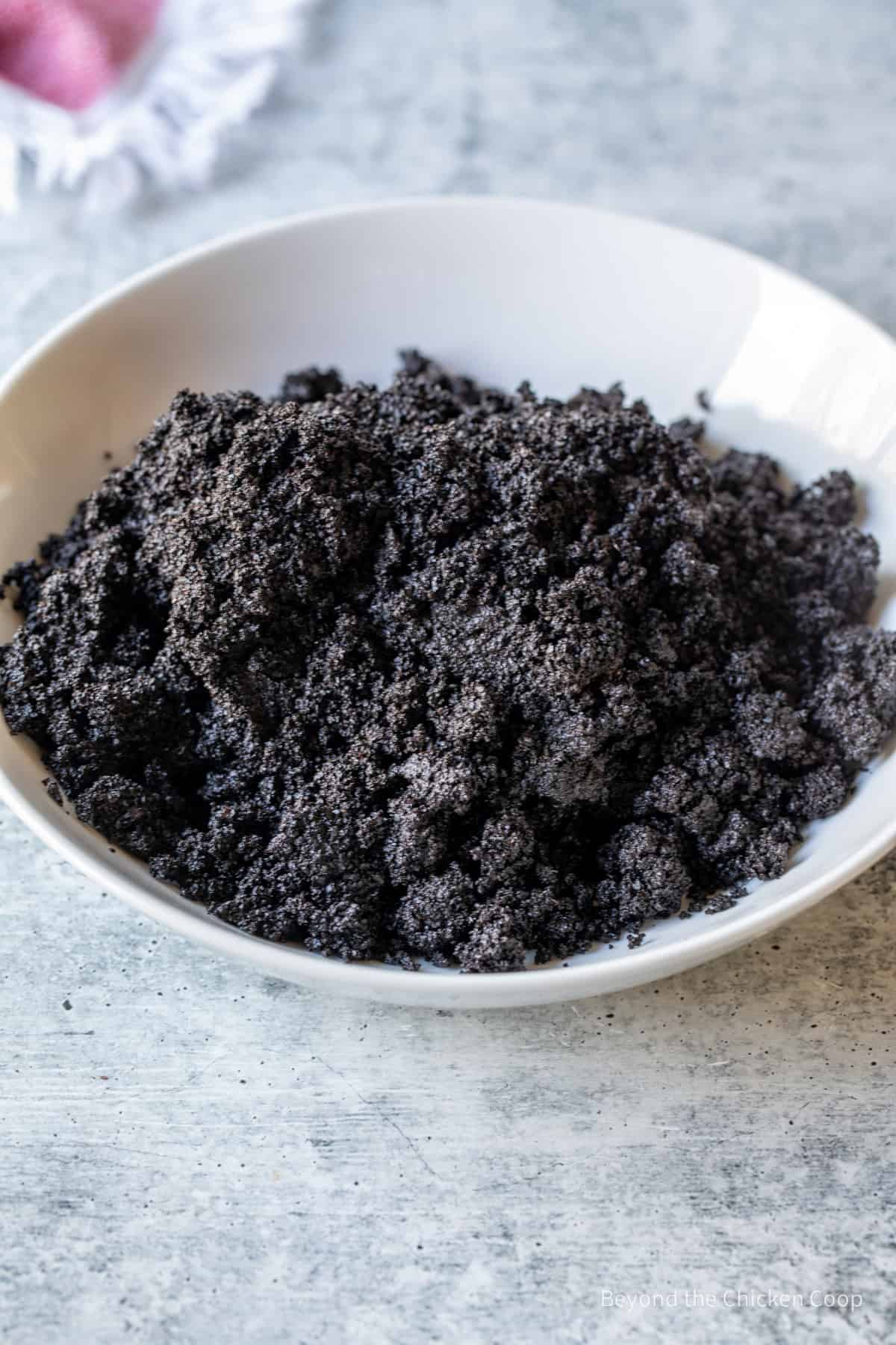 A bowl with ground coffee.