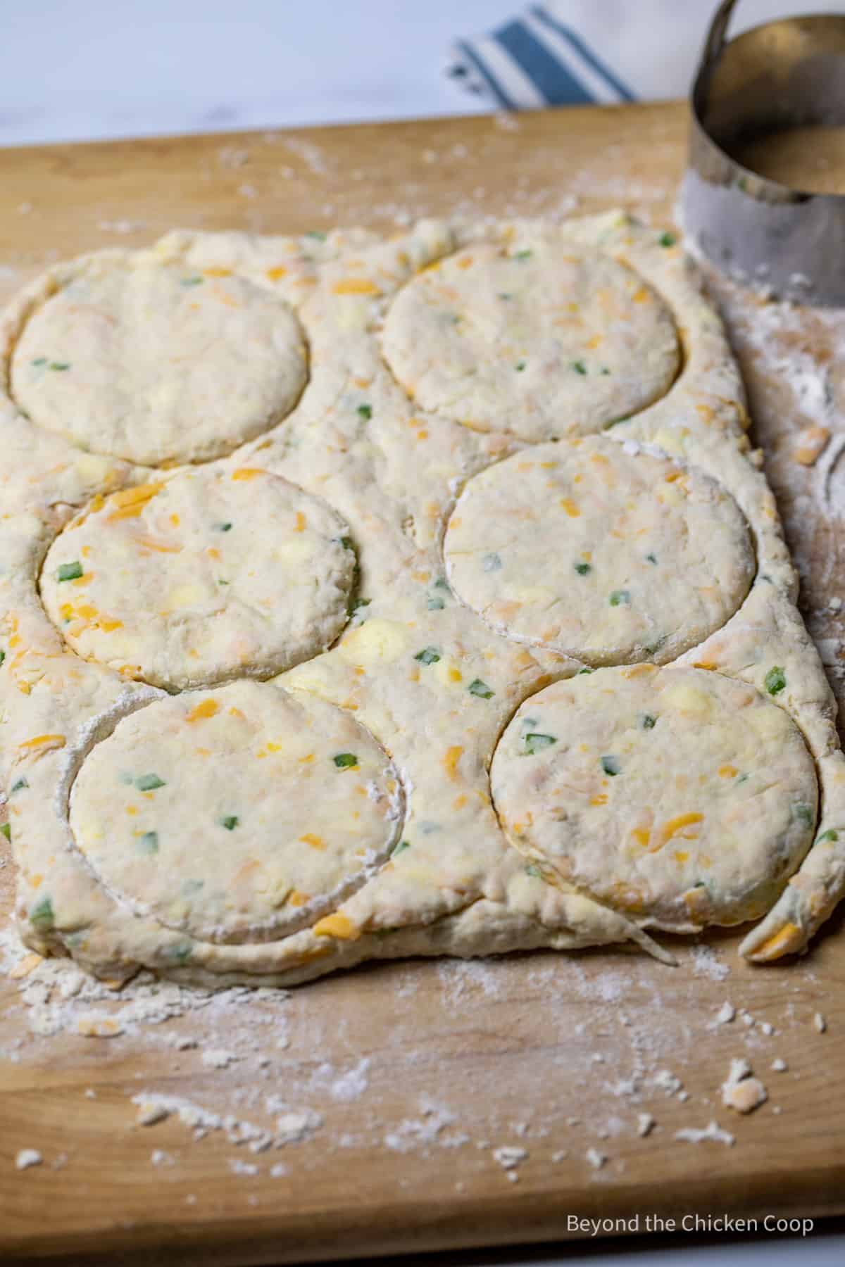 Cutting out biscuits.