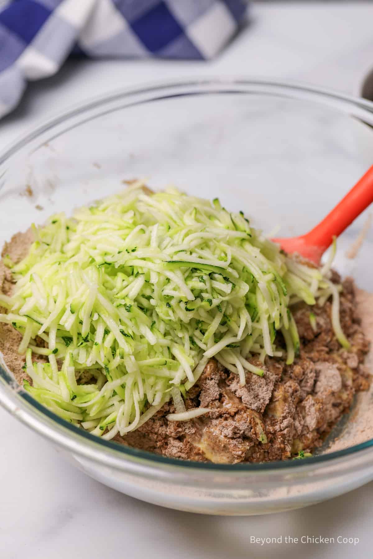 Grated zucchini added to chocolate batter.