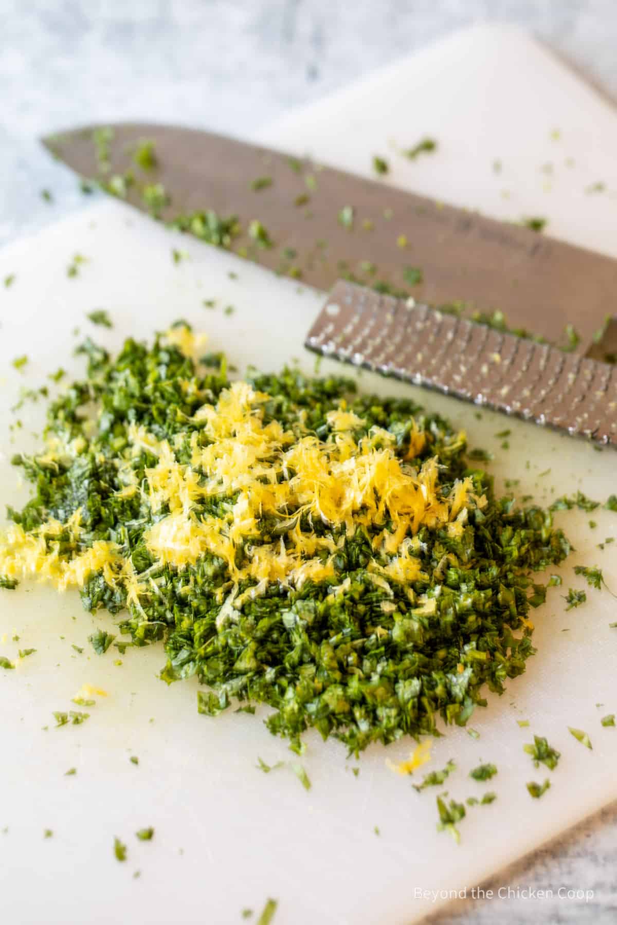 Lemon zest on top of chopped parsley.