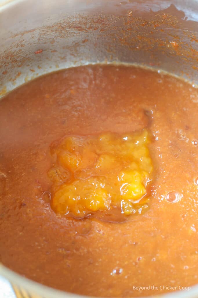 Jam added to a homemade barbecue sauce. 