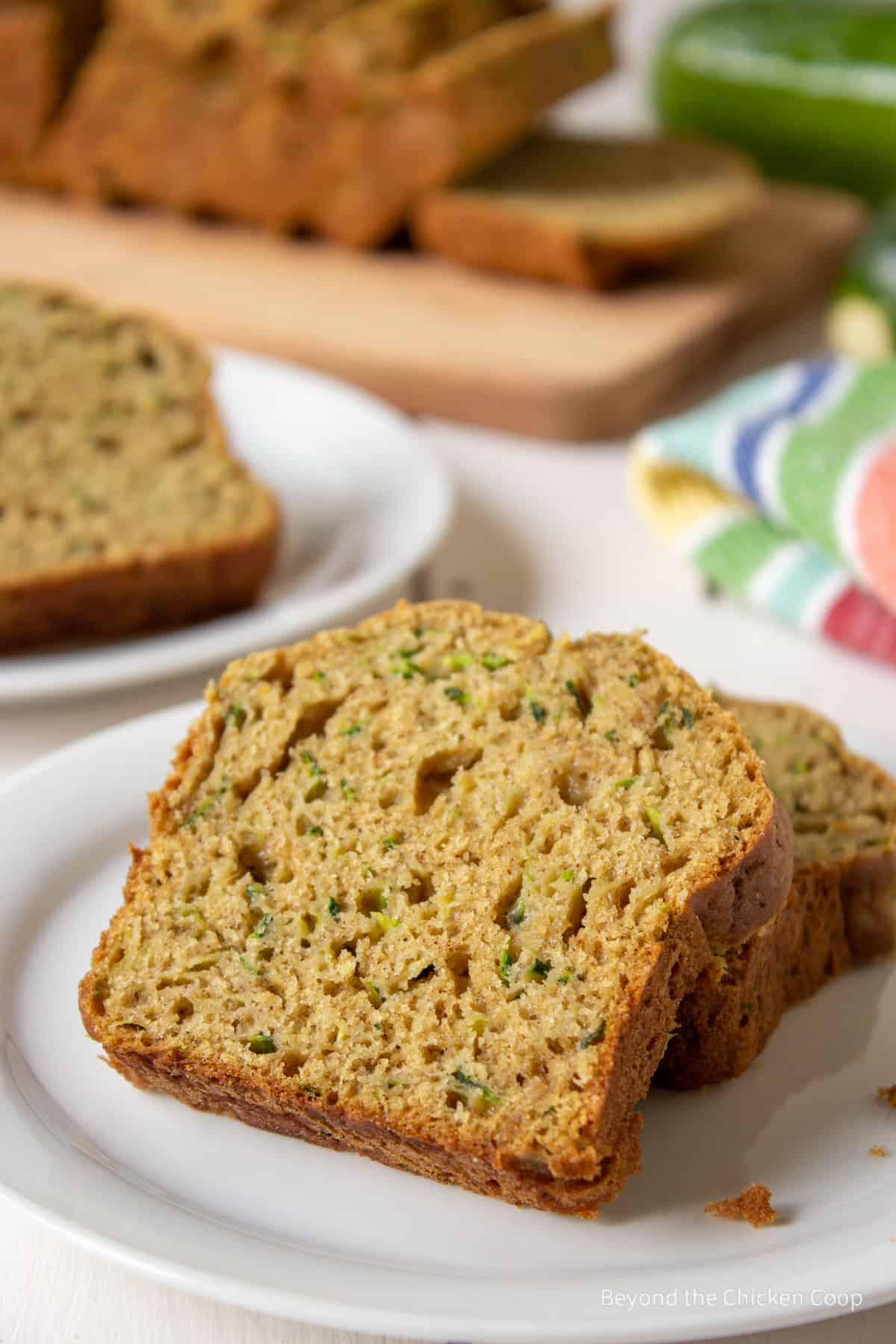 Slice bread on a small white plate.