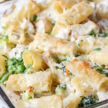 A casserole dish filled with pasta and chicken.