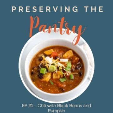 A bowl of chili with black beans.