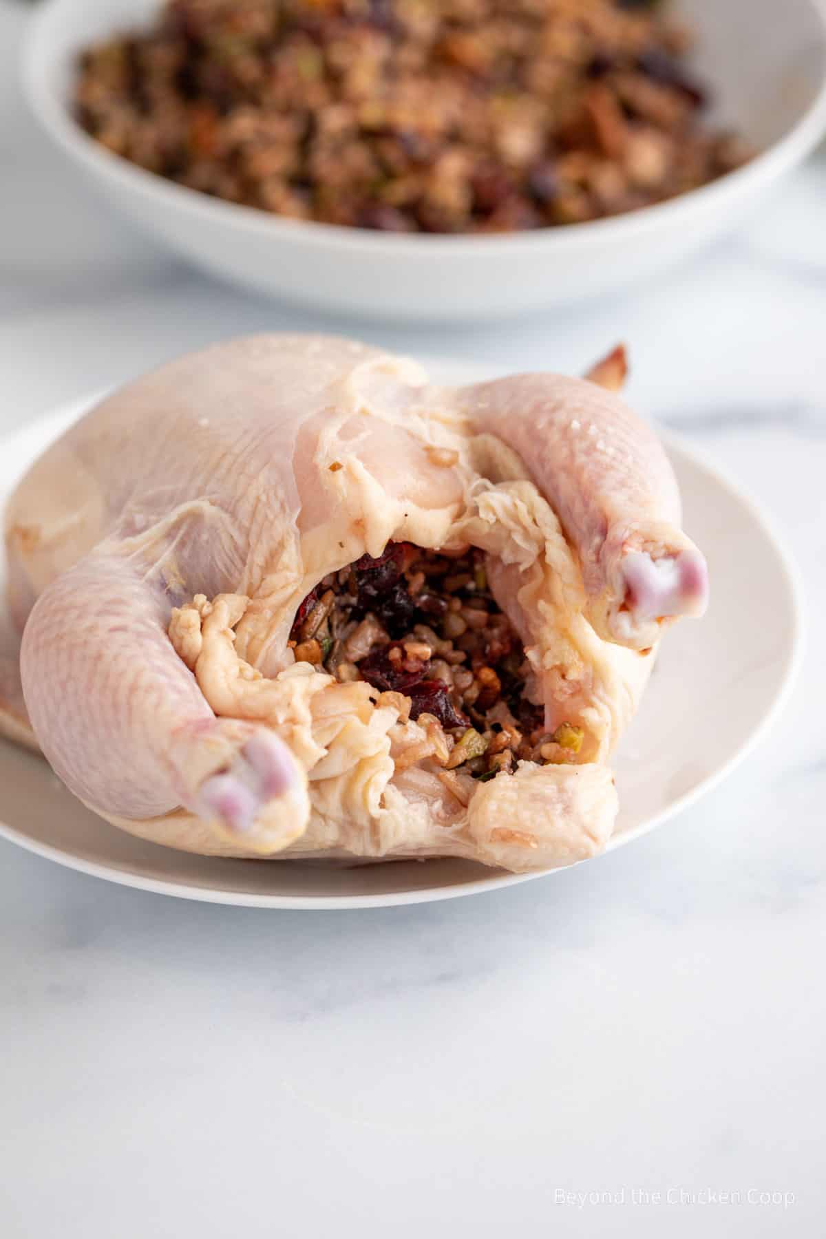 Rice stuffing inside a cornish hen.