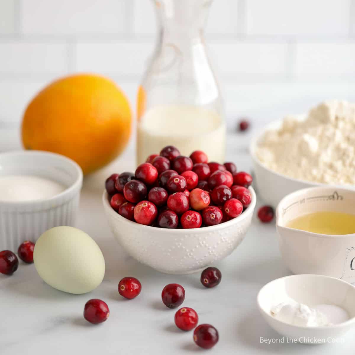 Ingredients for making cranberry muffins.