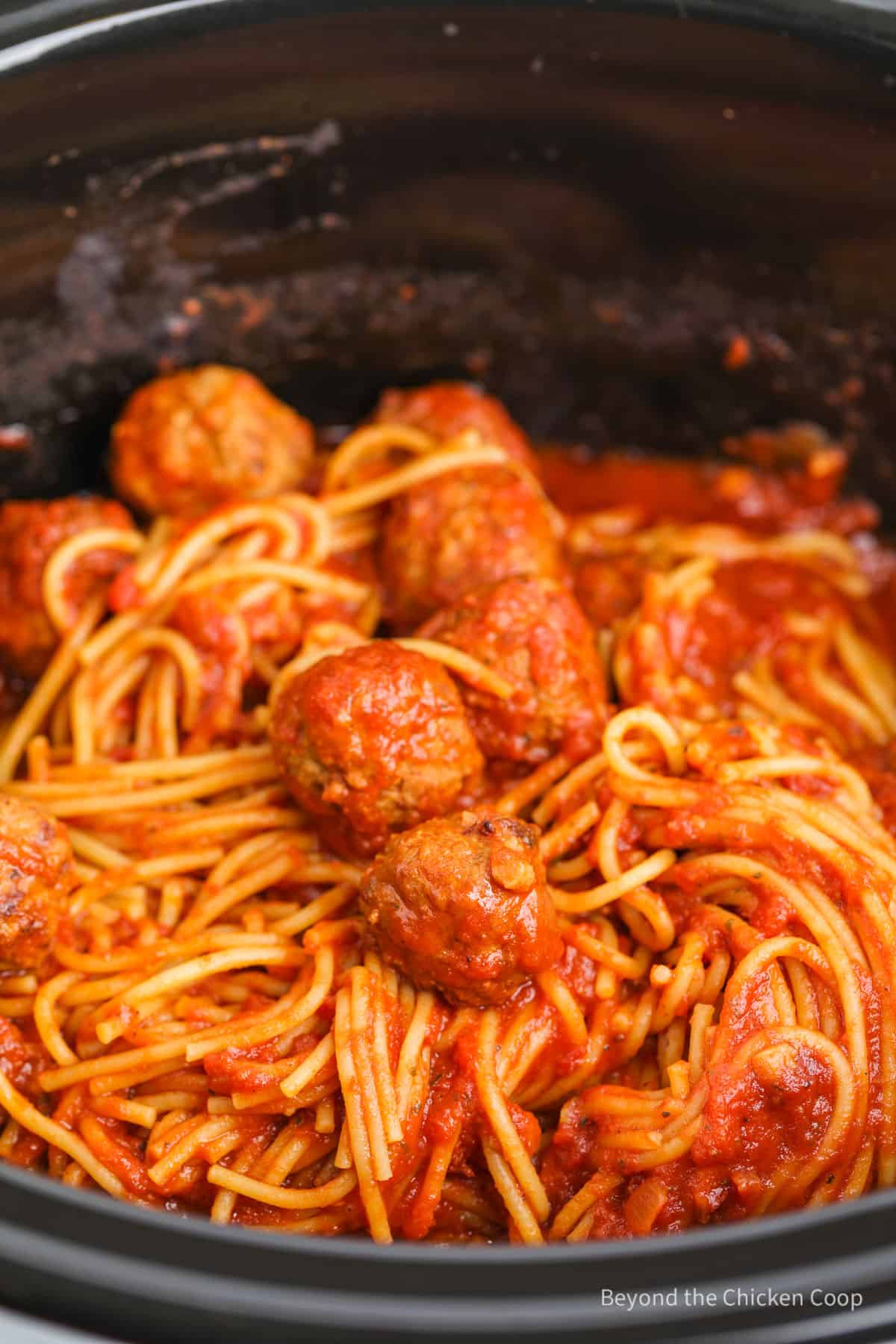 Spaghetti and meatballs in a crock pot. 