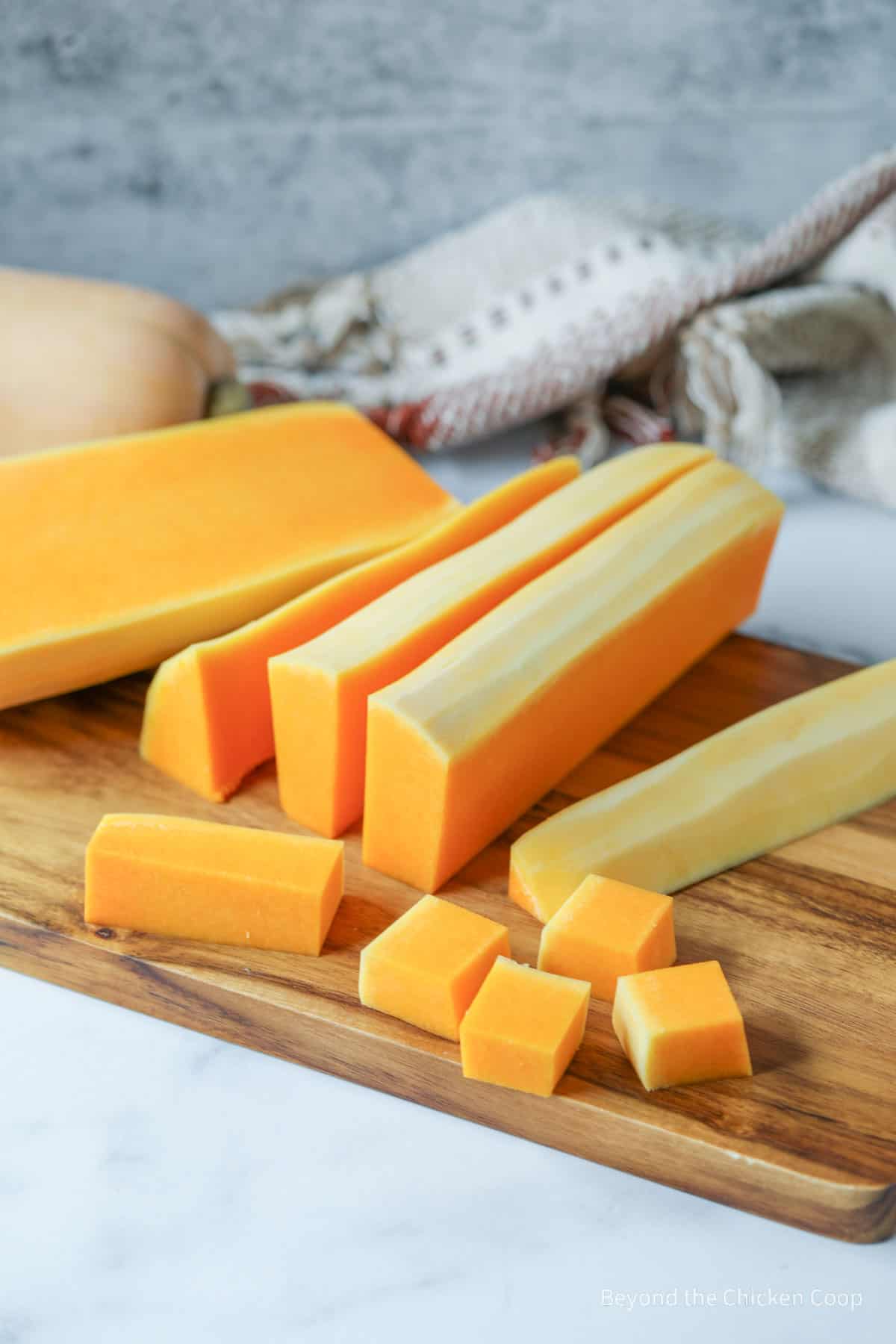 Slicing squash into long strips.