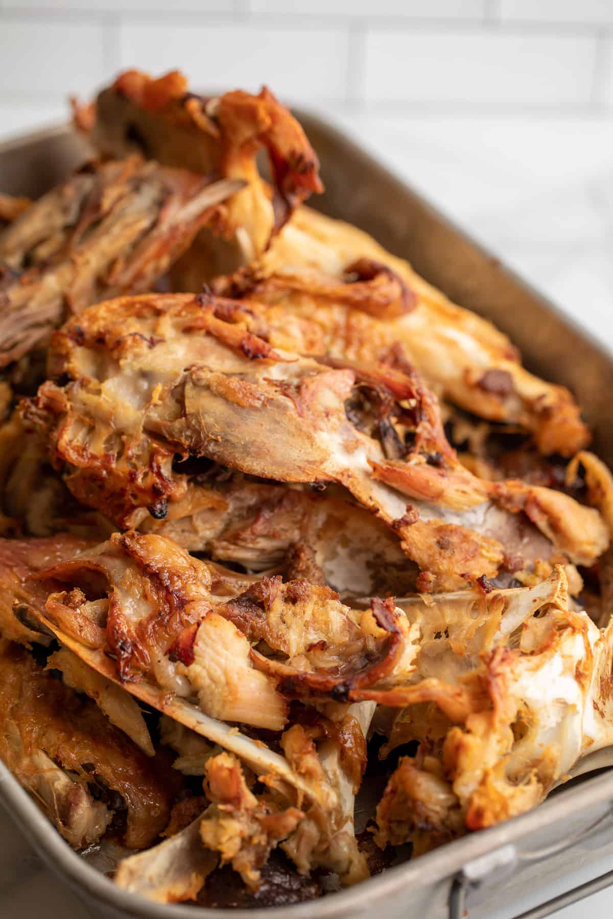 Roasted turkey bones in a roasting pan. 