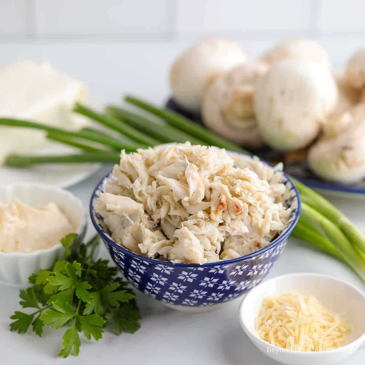 Ingredients for making crab stuffed mushrooms.