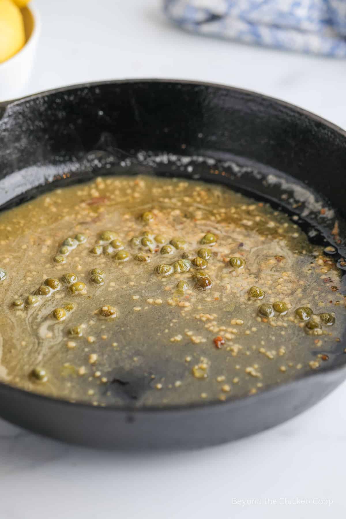 Lemon butter in a cast iron pan. 