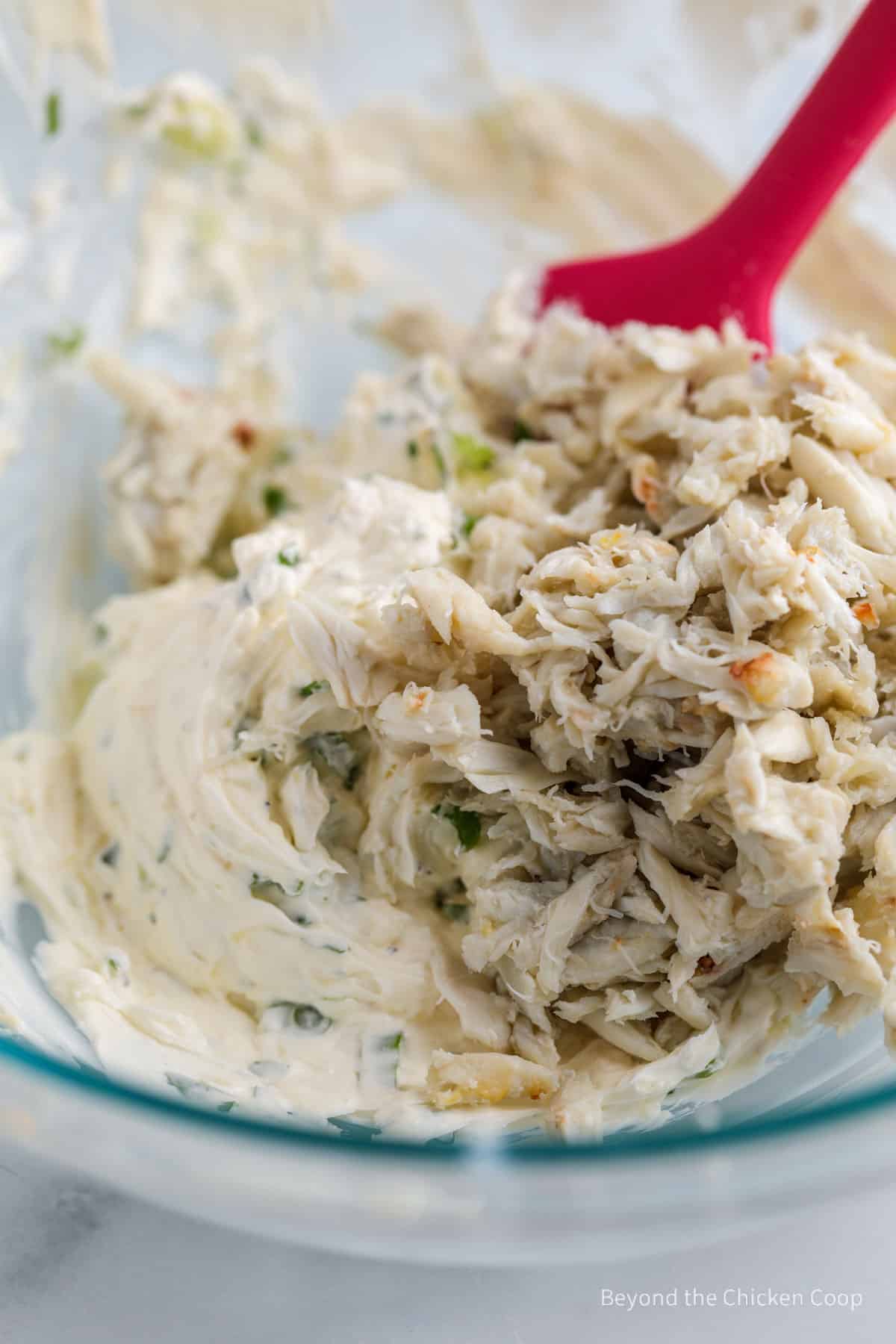 Lumped crab added to a cream cheese mixture. 