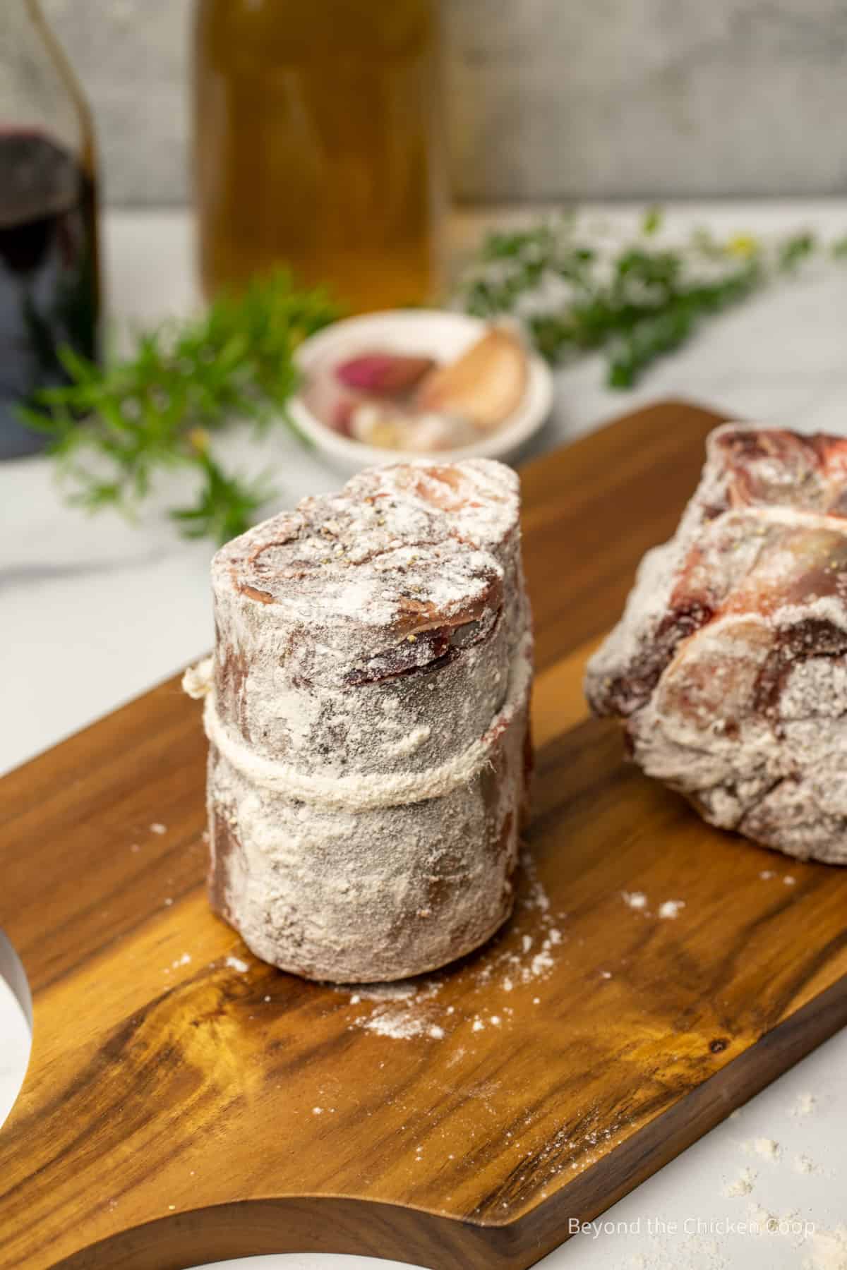 Elk shanks dusted in flour. 