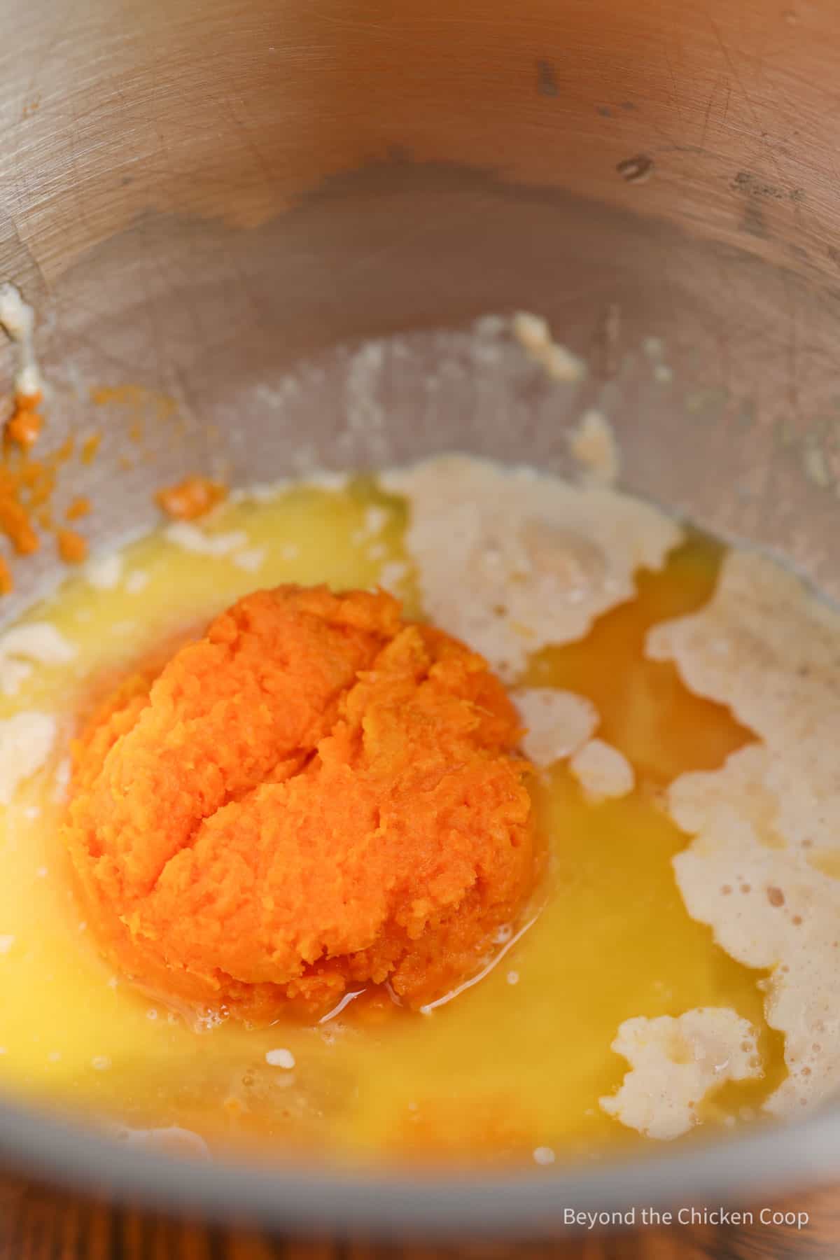 A mixing bowl with sweet potatoes.