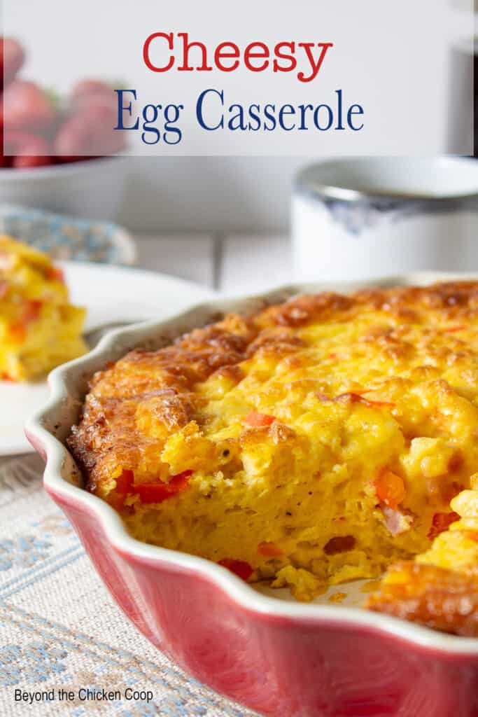 An egg casserole in a red dish.