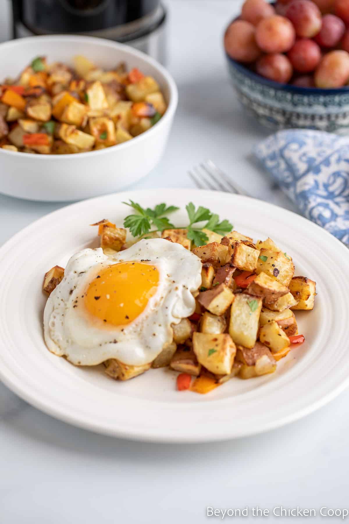 Country potatoes with a sunny side up egg. 