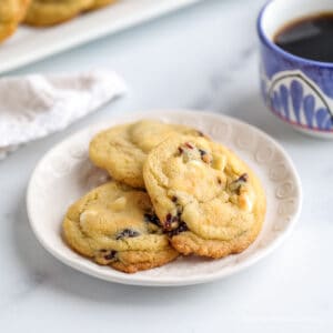 Three cookies with cranberries and white chocolate chips