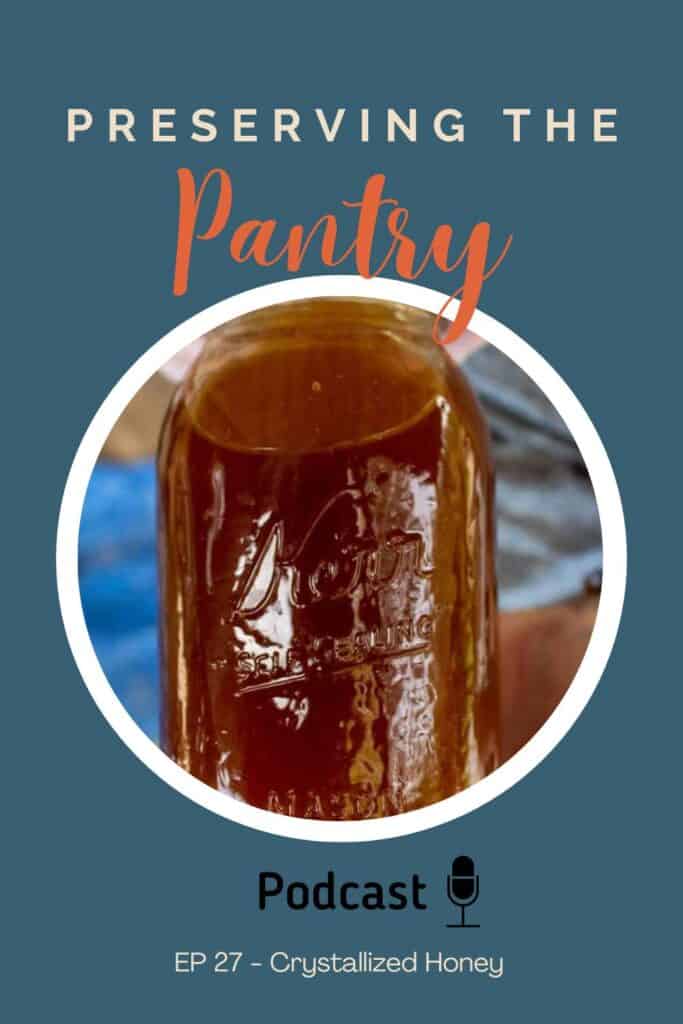 A jar filled with honey and topped with a white lid.