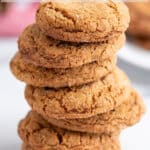 A stack of cookies on a white counter.