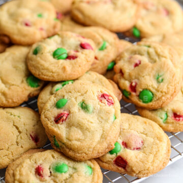Cookies with red and green candy pieces.