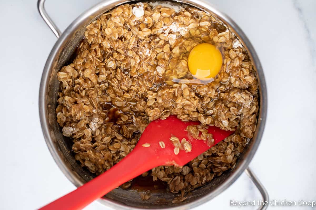 Egg and vanilla in a pan with oatmeal.