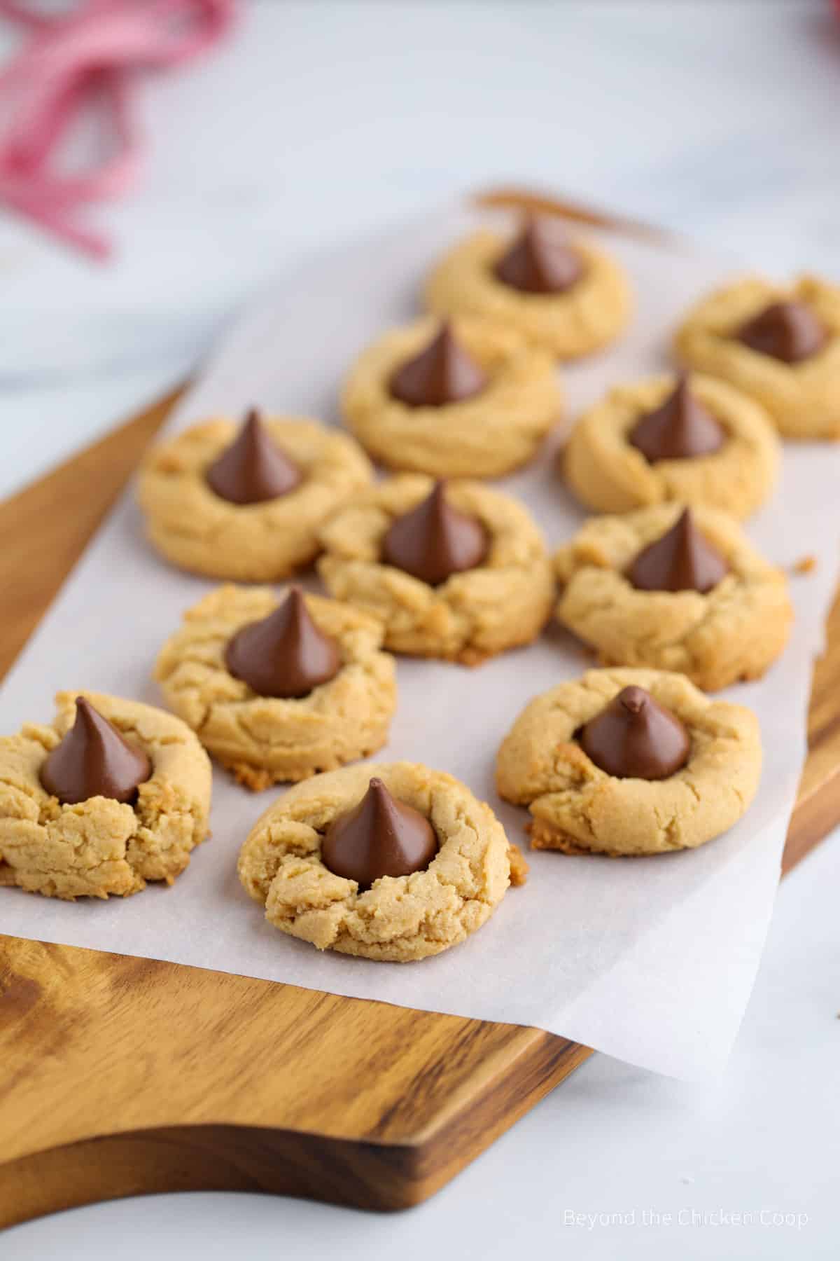 Cookies with chocolate kisses on a board. 
