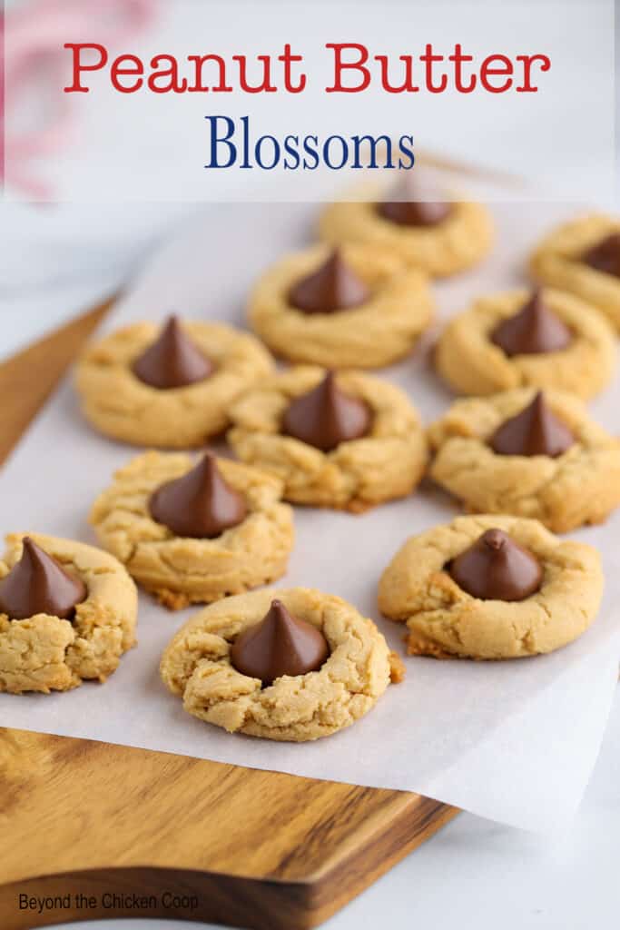 Peanut butter cookies with chocolate kisses in the center of each cookie.