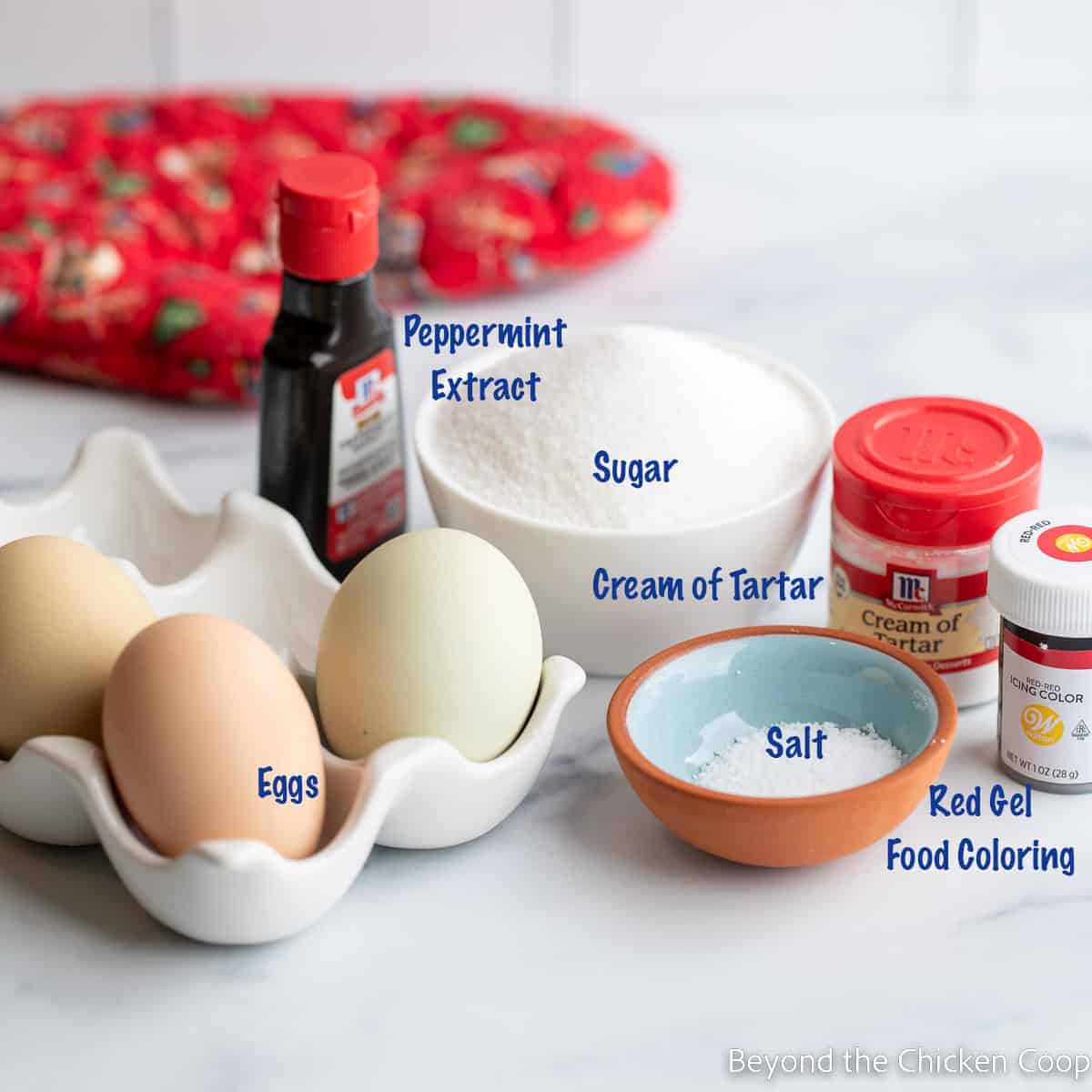 Eggs, sugar, peppermint and salt in small bowls.